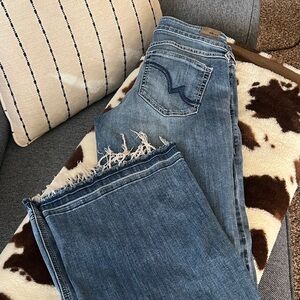 TWO pair Ariat Denim Flare Jeans with Frayed Hem. One size 28R the other 27R